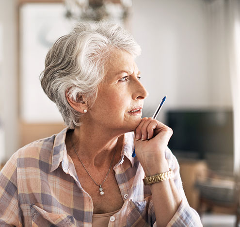 A woman looking at a window. Links to Gifts by Will A woman looking at a window. Links to Gifts by Will