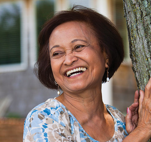 Older woman smiling. Links to Gifts from Retirement Plans